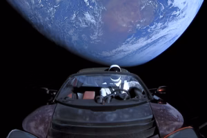 Tesla sets October 1 unveiling for long-delayed Roadster